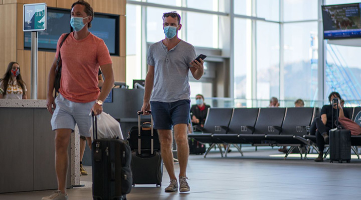 Masked travelers - Safe travel requires health tips