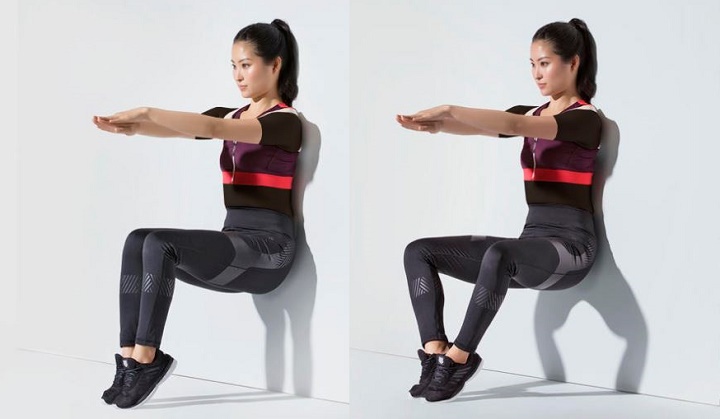 ورزش با دیوار؛ ۱۶ حرکت ورزشی برای خانه یا محل کار 6 ورزش با دیوار - حرکت صدف در وضعیت اسکوات با دیوار