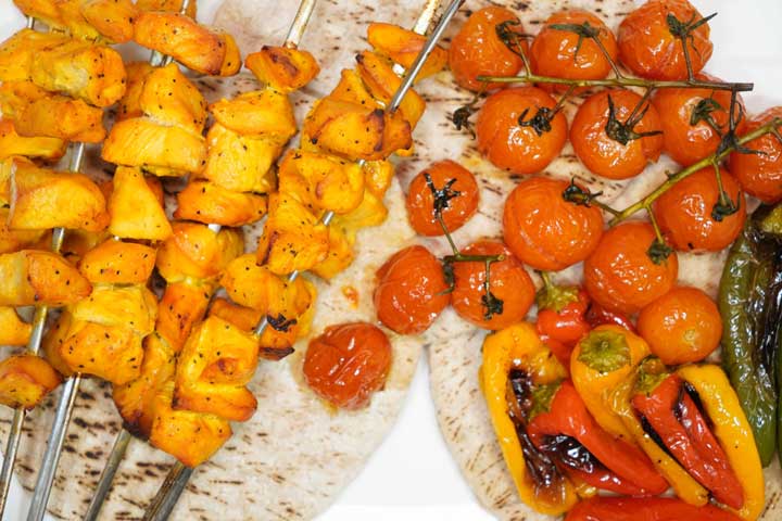 Grease the kebab skewers
